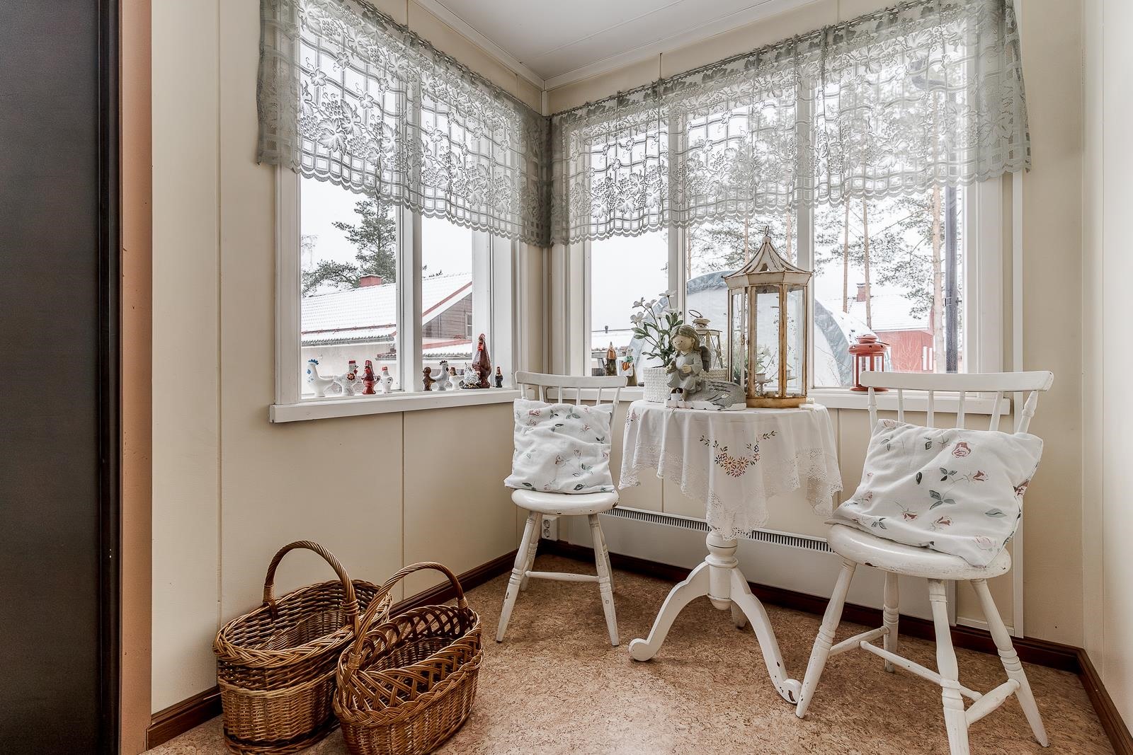 Sisääntulon lasikuisti