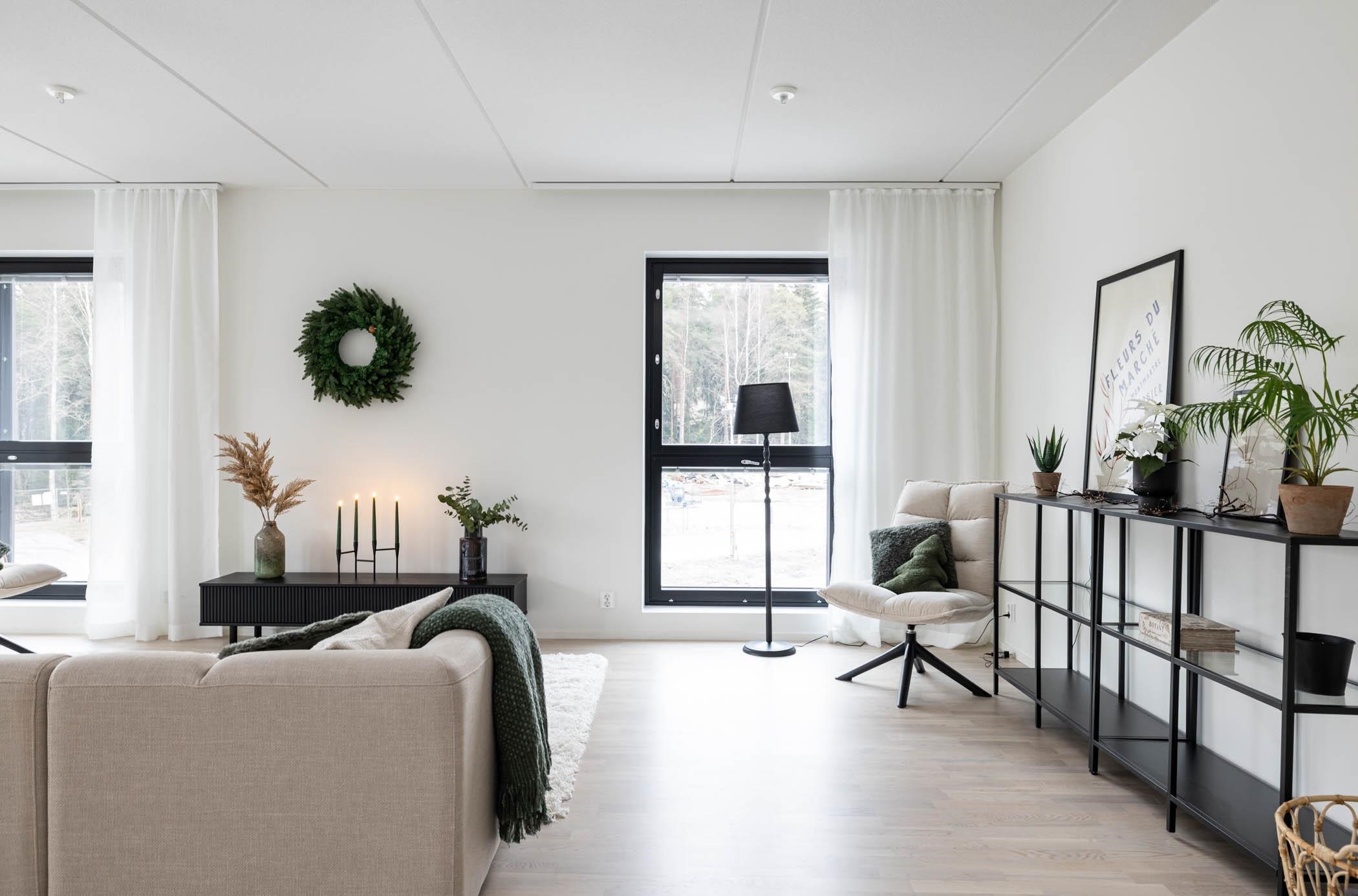 Kuva mallikalustetusta kolmiosta